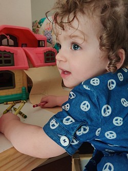 A little charmer, India at 17 months loves playing with big brother Oscar
